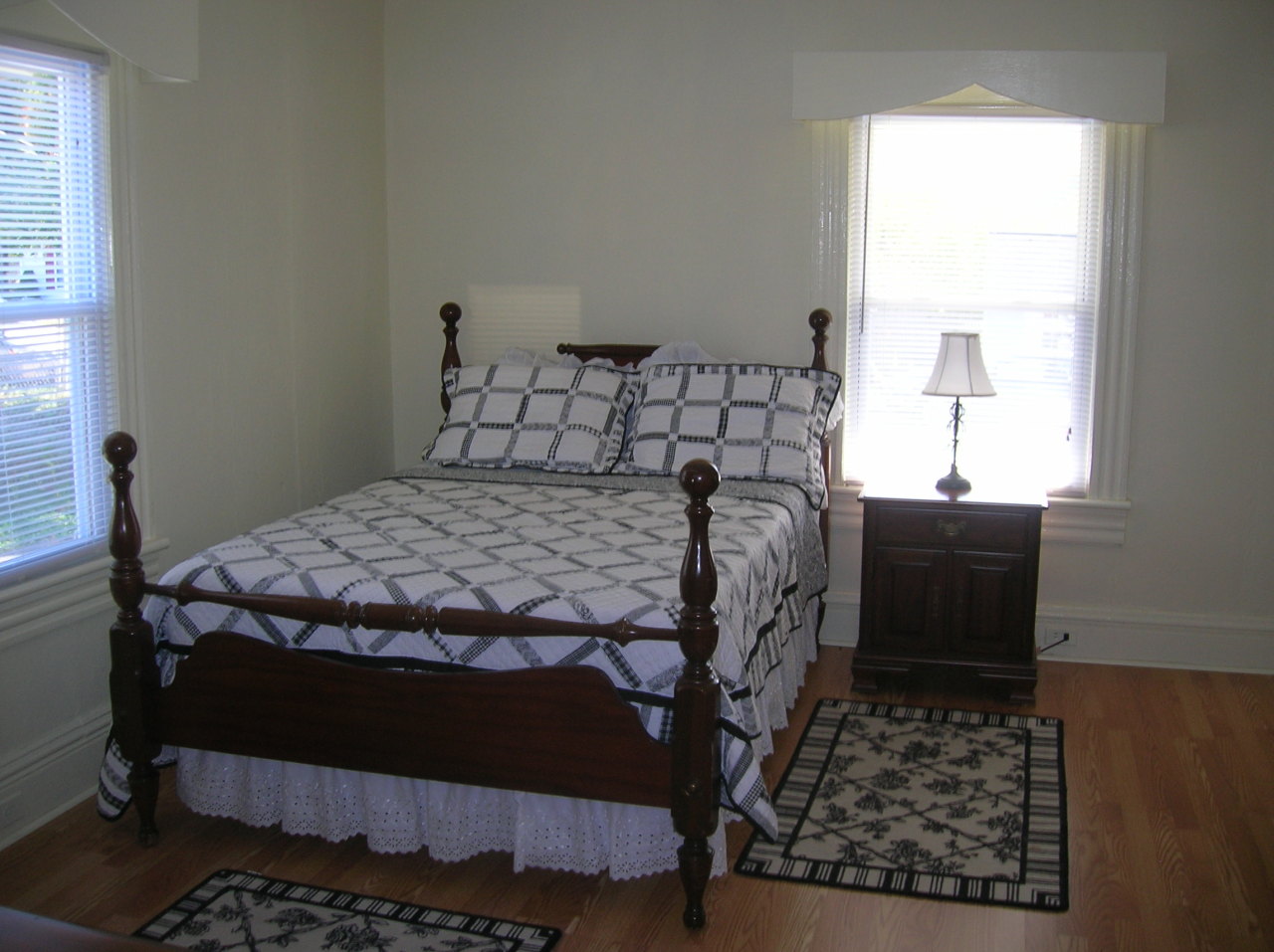 1516 Riverside Terrace Southeast Roanoke, VA 24014 - Photo 3 of 12 a bedroom with a bed and a window