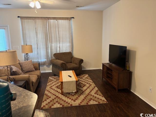328 Kiskadee Loop, Unit 15C Conway, SC 29526 - Photo 4 of 18 Living room with dark wood-style floors, a ceiling fan, and plenty of natural light