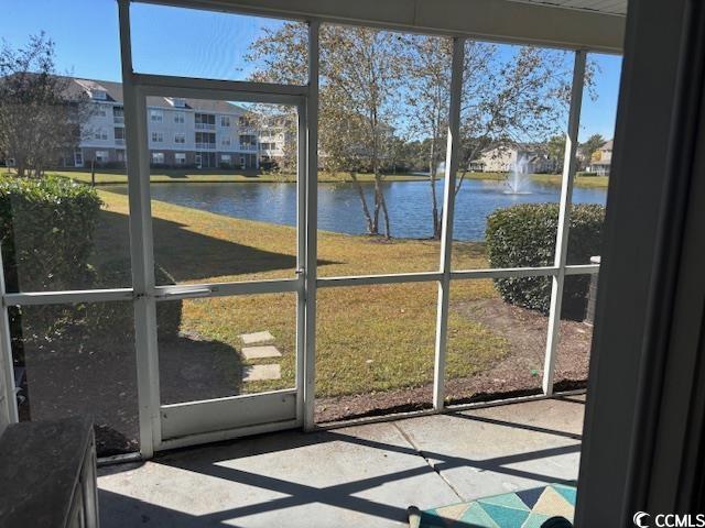 328 Kiskadee Loop, Unit 15C Conway, SC 29526 - Photo 6 of 18 Unfurnished sunroom with a water view