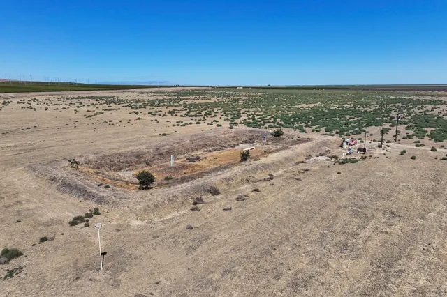 a view of a terrace with chairs