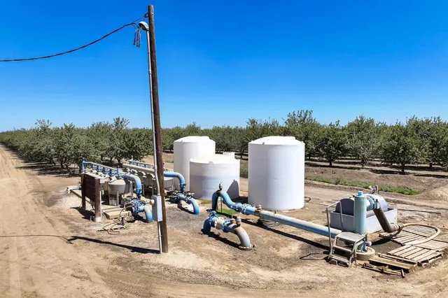 a roof deck view with a sitting space