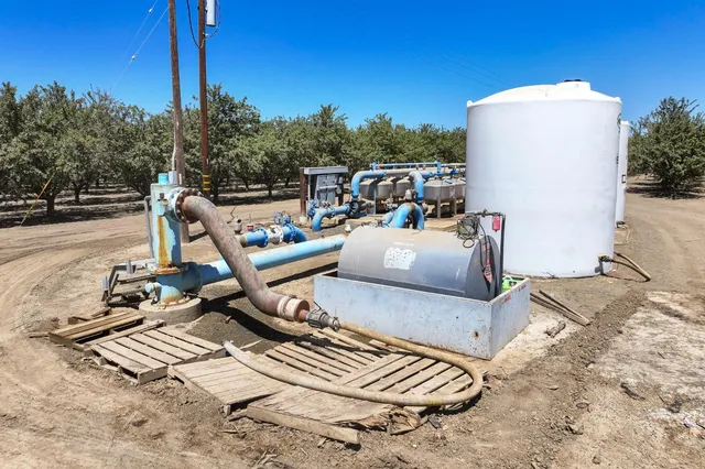 a view of swimming pool with a yard