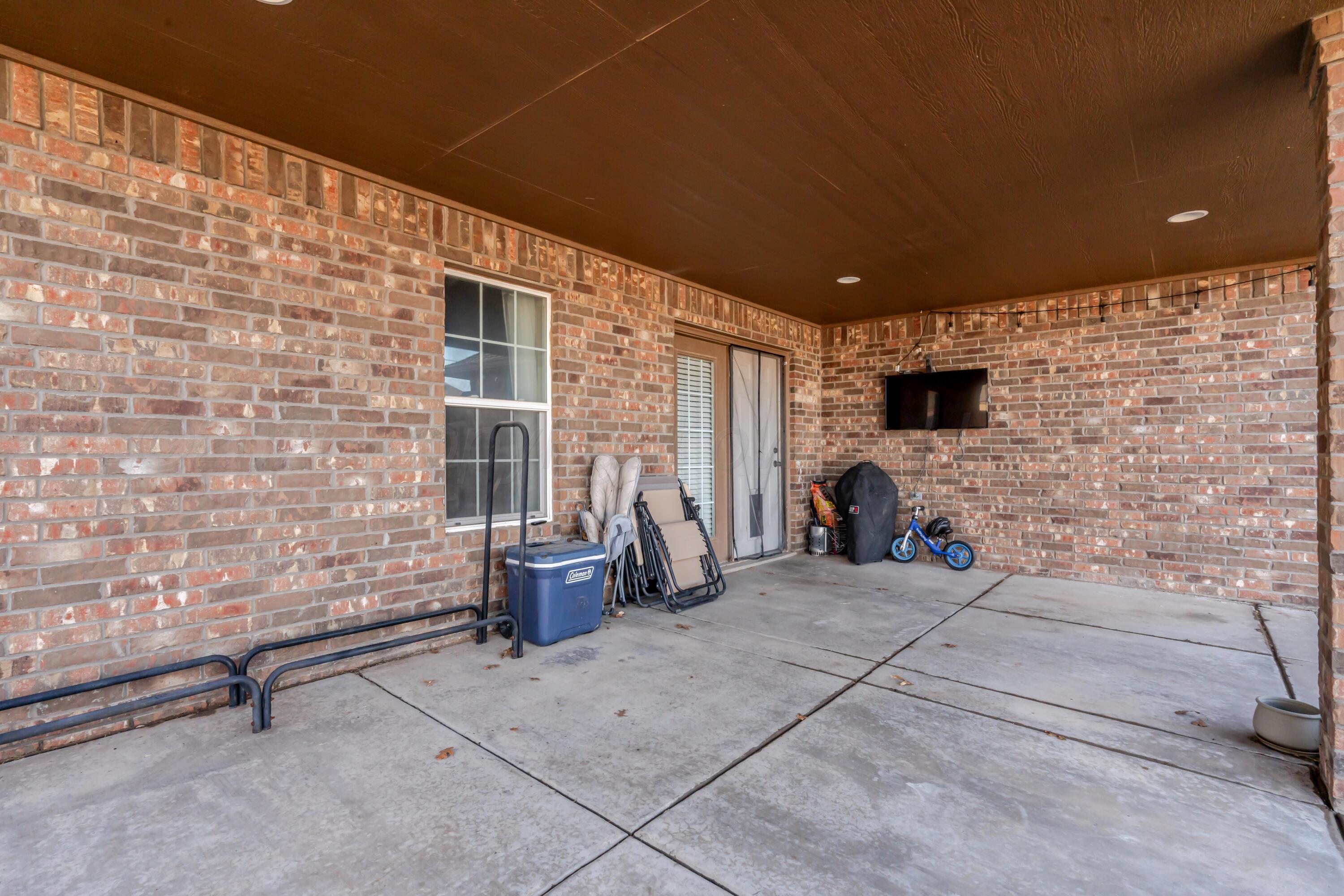 6814 Tivis Street Amarillo, TX 79119 - Photo 30 of 37 a view of livingroom with fireplace