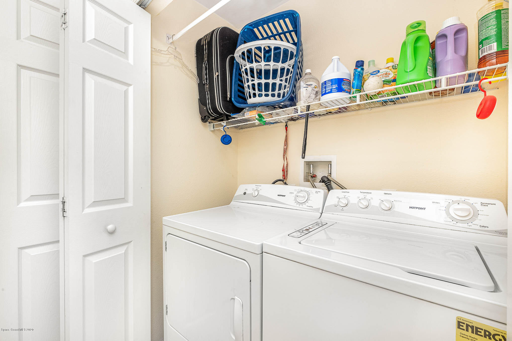 498 Scarlet Road Southwest Palm Bay, FL 32908 - Photo 20 of 24 a utility room with dryer and washer