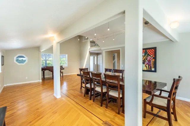 a kitchen with stainless steel appliances granite countertop a stove and cabinets