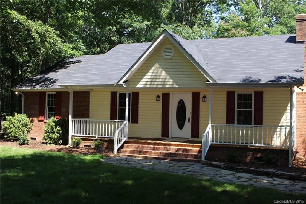 2205 New Salem Road Monroe, NC 28110 - Photo 2 of 18 a front view of a house with garden