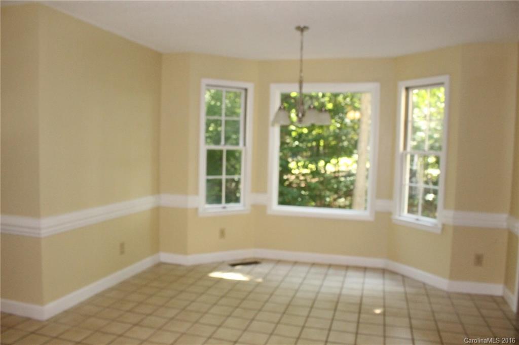 2205 New Salem Road Monroe, NC 28110 - Photo 14 of 18 a view of an empty room with a window