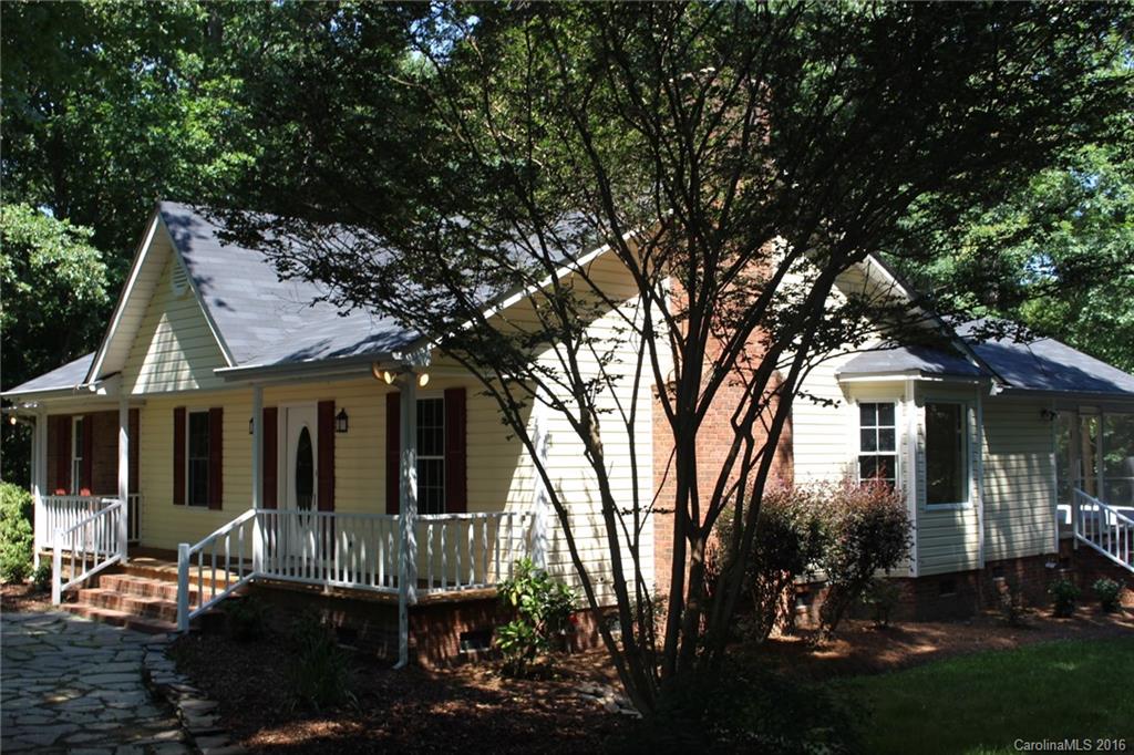 2205 New Salem Road Monroe, NC 28110 - Photo 4 of 18 front view of a house with a tree