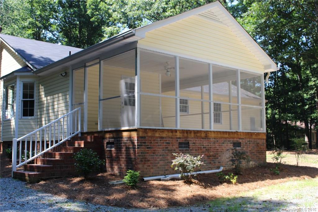 2205 New Salem Road Monroe, NC 28110 - Photo 7 of 18 a front view of a house with garden