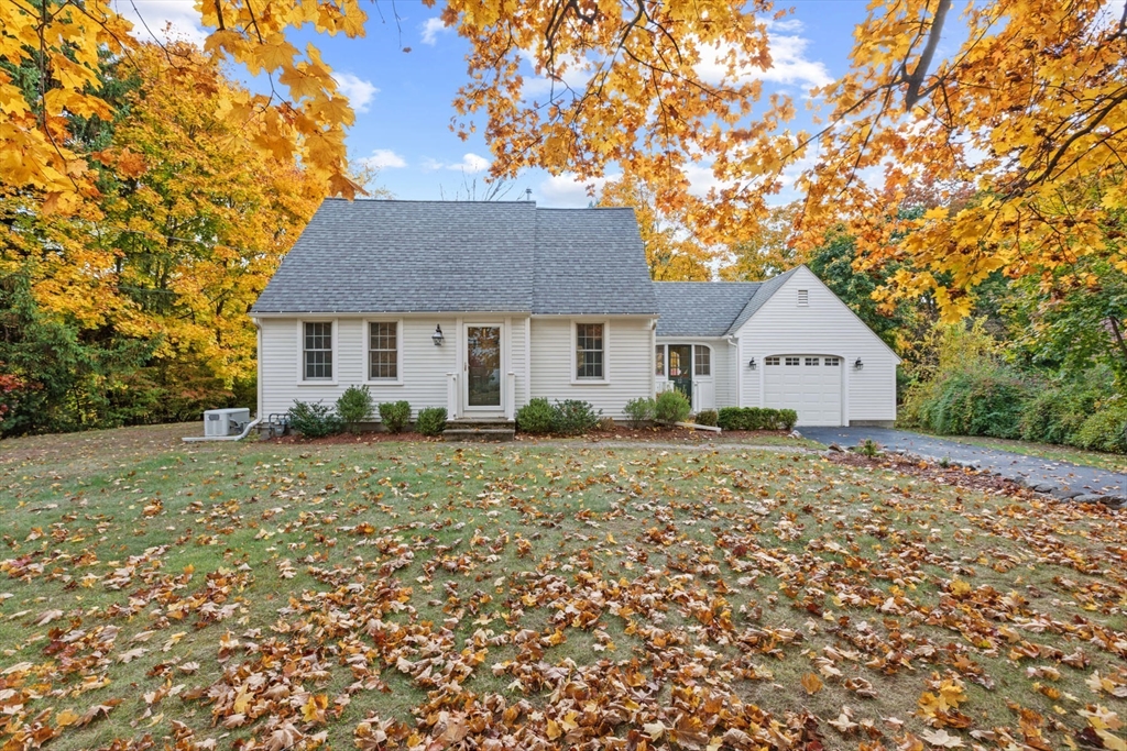 12 Hall Road Chelmsford, MA 01824 - Photo 1 of 32 a view of a house with a yard