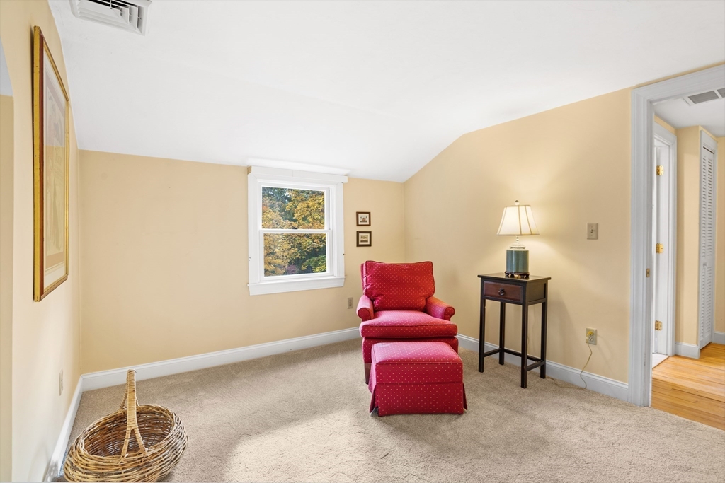 12 Hall Road Chelmsford, MA 01824 - Photo 18 of 32 a living room with furniture and a window