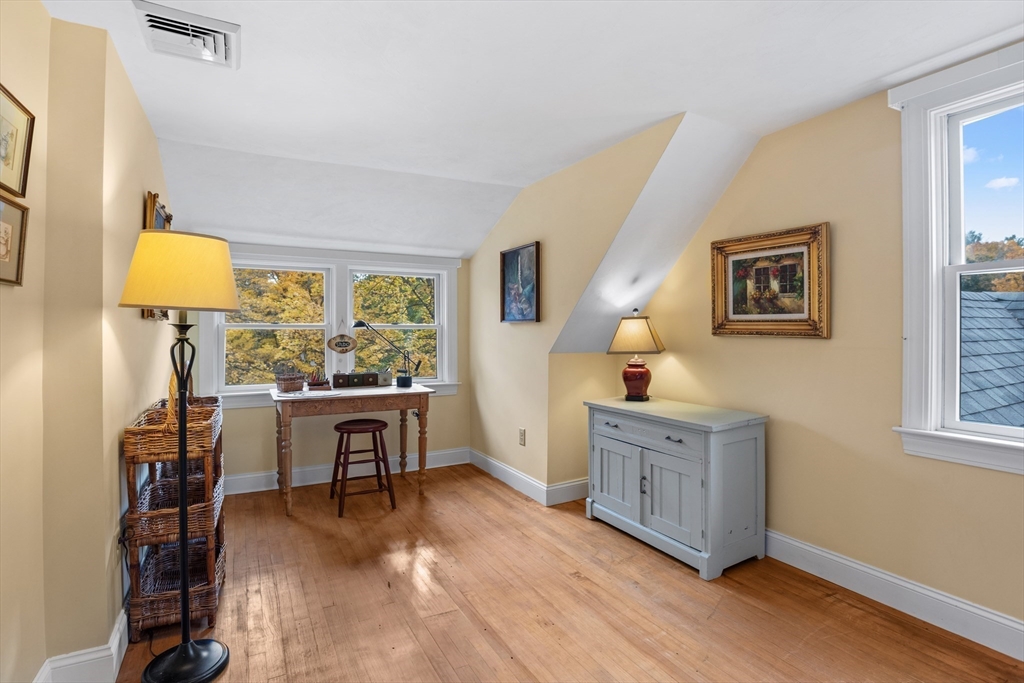 12 Hall Road Chelmsford, MA 01824 - Photo 20 of 32 a view of a workspace with furniture and a window