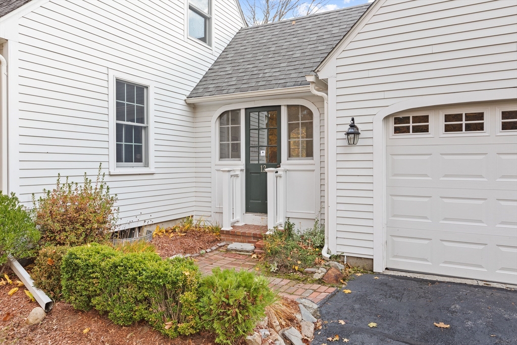 12 Hall Road Chelmsford, MA 01824 - Photo 4 of 32 a front view of a house with a yard