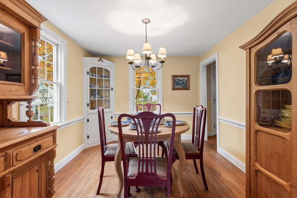 12 Hall Road Chelmsford, MA 01824 - Photo 9 of 32 a view of a dining room with furniture window and outside view