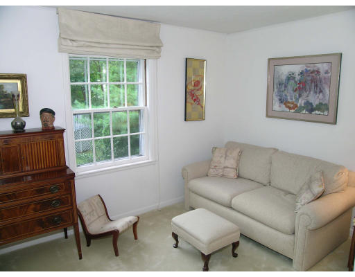 294 Woodcliff Road Newton, MA 02461 - Photo 4 of 11 a living room with furniture and a window