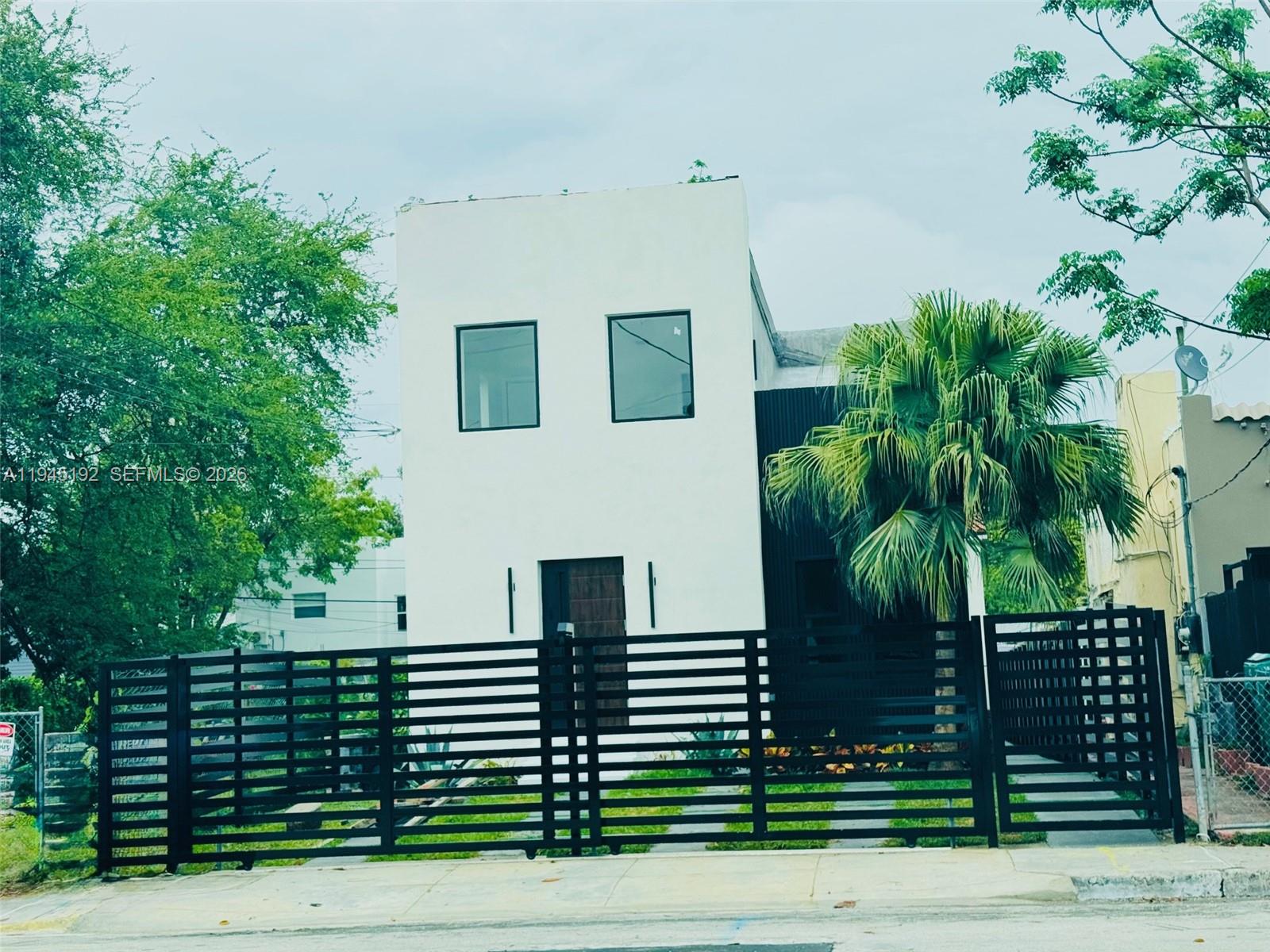 905 Southwest 13th Court Miami, FL 33135 - Photo 1 of 51 a view of front door and yard