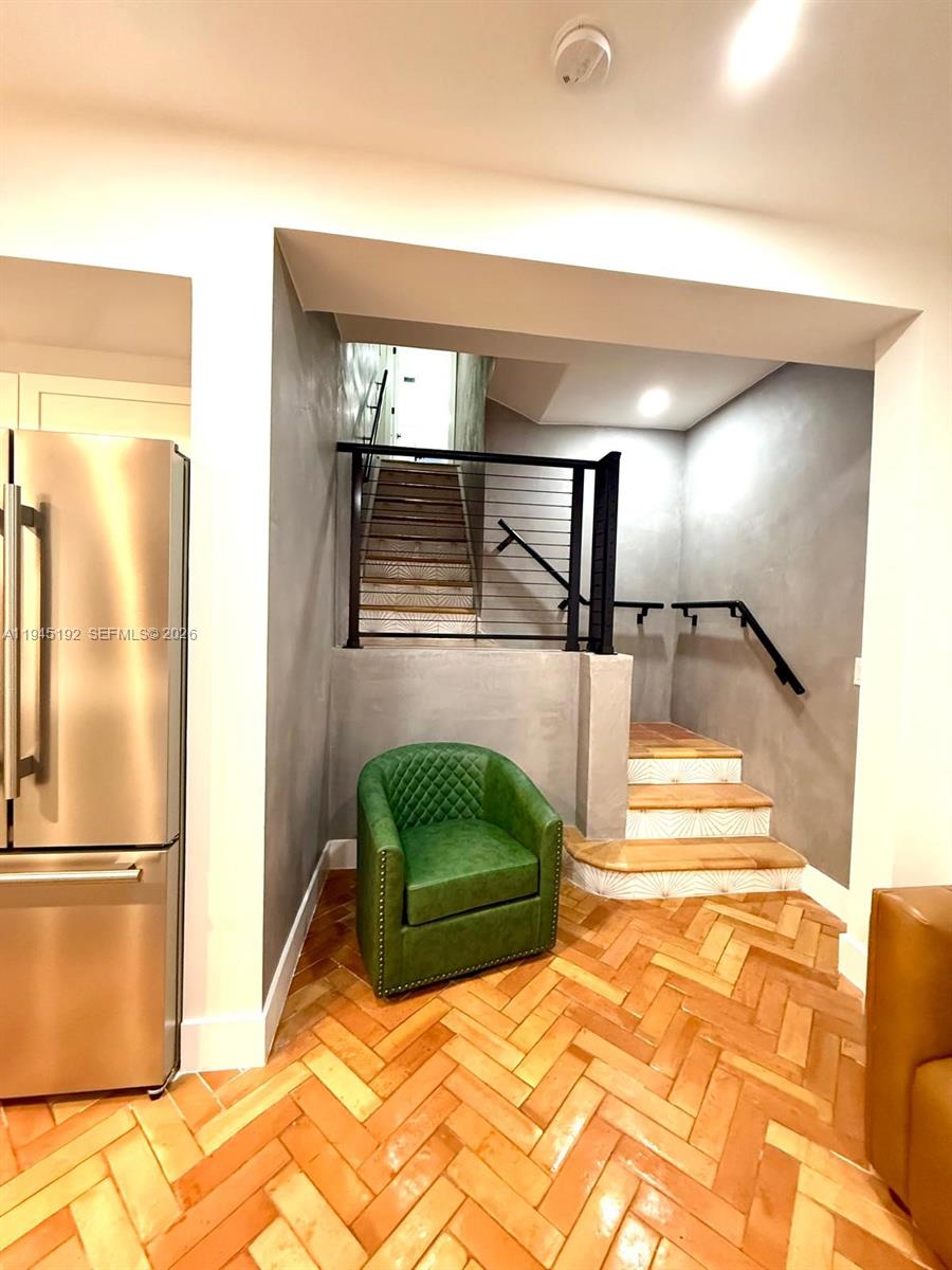 905 Southwest 13th Court Miami, FL 33135 - Photo 12 of 51 a bedroom with a bed and flowerpot