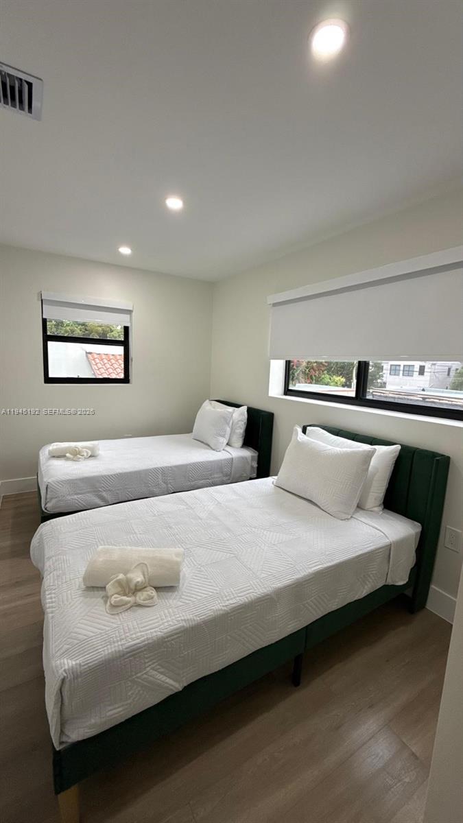 905 Southwest 13th Court Miami, FL 33135 - Photo 23 of 51 a bedroom with bed and window