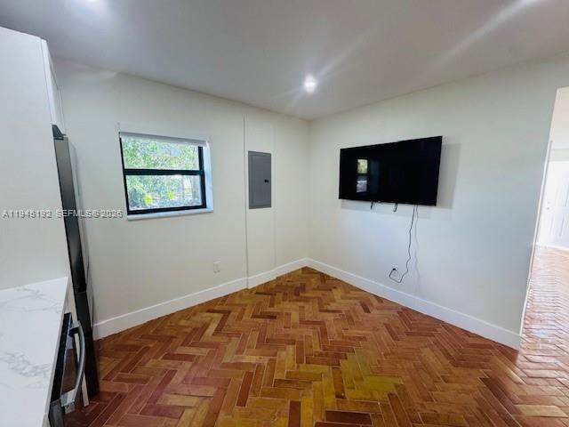 905 Southwest 13th Court Miami, FL 33135 - Photo 26 of 51 a bedroom with a bed and a flat screen tv