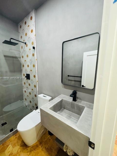 905 Southwest 13th Court Miami, FL 33135 - Photo 28 of 51 a bathroom with a sink and a mirror