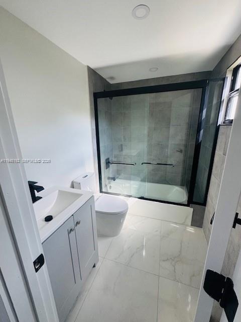 905 Southwest 13th Court Miami, FL 33135 - Photo 36 of 51 a bathroom with a sink a toilet and shower