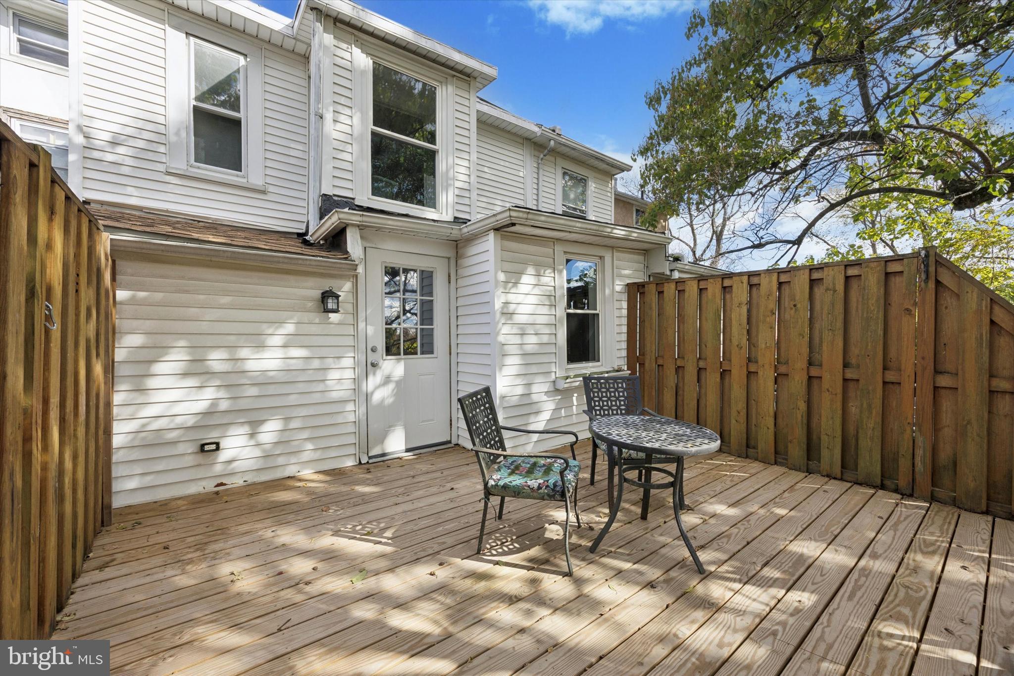 50 Blanchard Road Drexel Hill, PA 19026 - Photo 14 of 35 a patio with table and chairs and potted plants