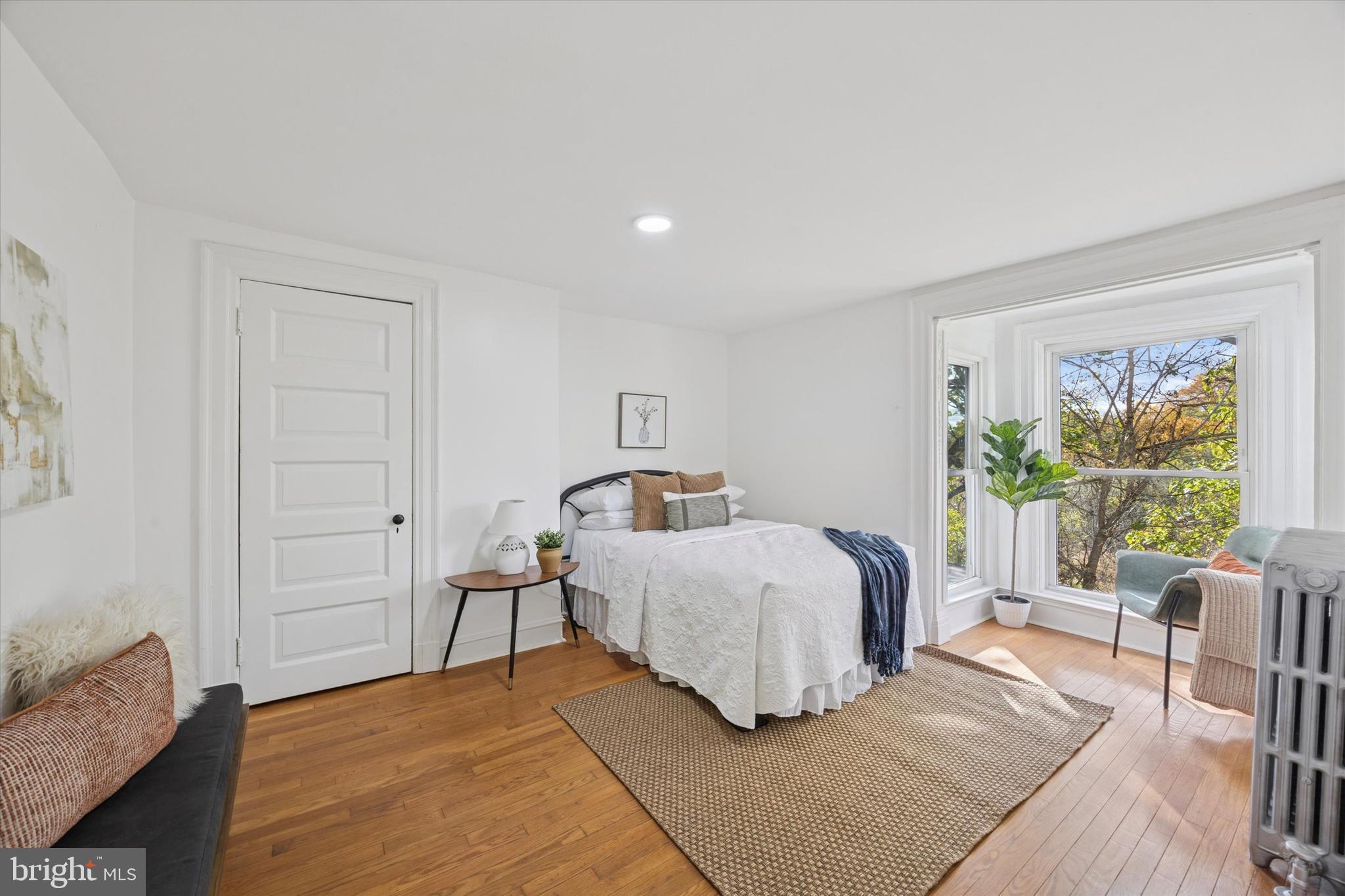 50 Blanchard Road Drexel Hill, PA 19026 - Photo 16 of 35 a bedroom with a bed and wooden floor