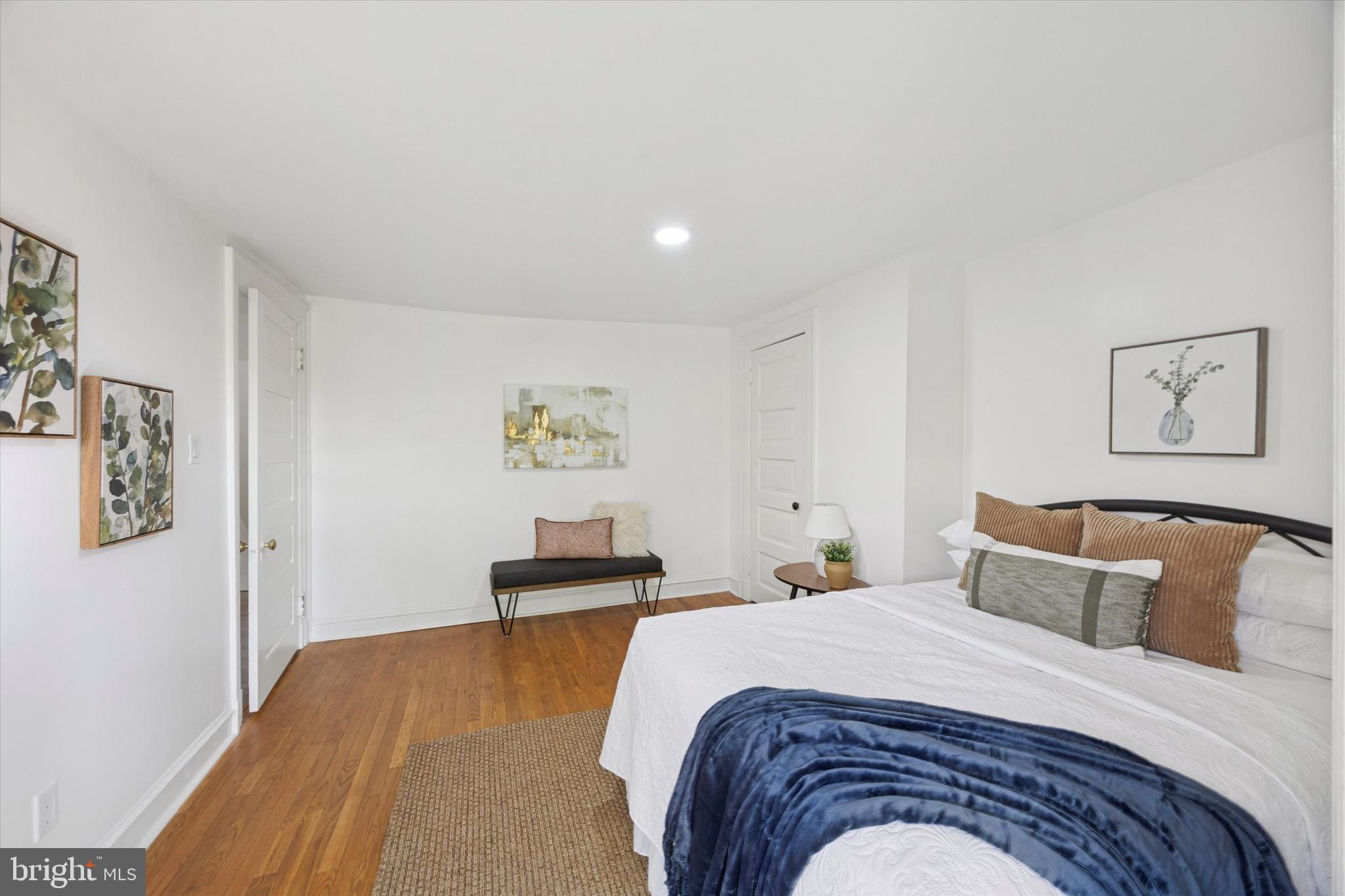 50 Blanchard Road Drexel Hill, PA 19026 - Photo 18 of 35 a bedroom with a bed and wall painting