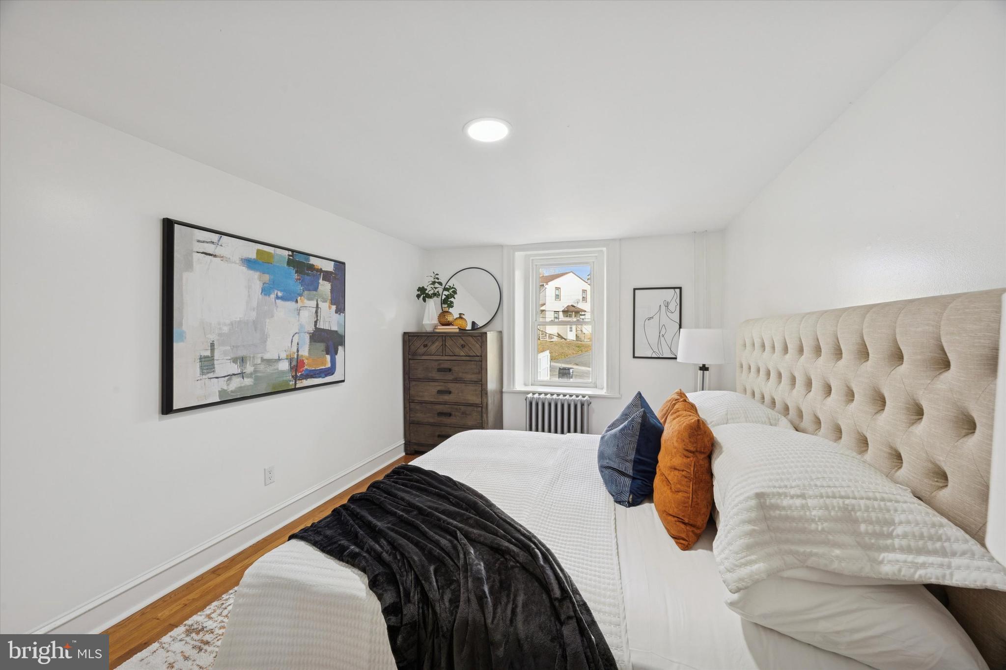 50 Blanchard Road Drexel Hill, PA 19026 - Photo 22 of 35 a bedroom with a bed and a painting on the wall