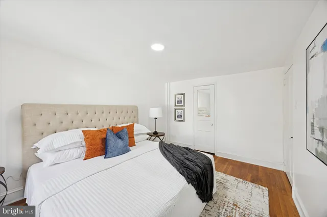 a bedroom with bed and window