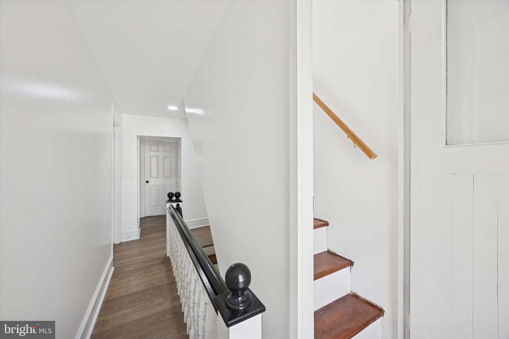 50 Blanchard Road Drexel Hill, PA 19026 - Photo 25 of 35 a hallway with front door and stairs