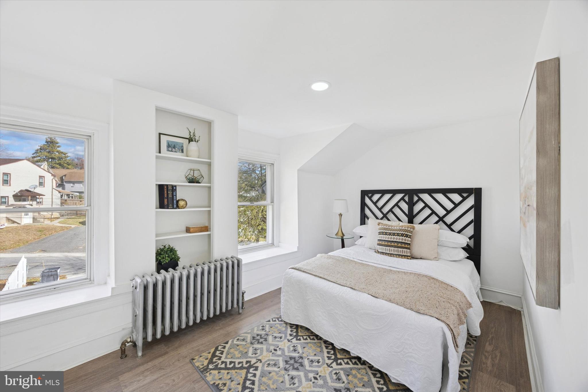 50 Blanchard Road Drexel Hill, PA 19026 - Photo 29 of 35 a bedroom with a large bed and a window