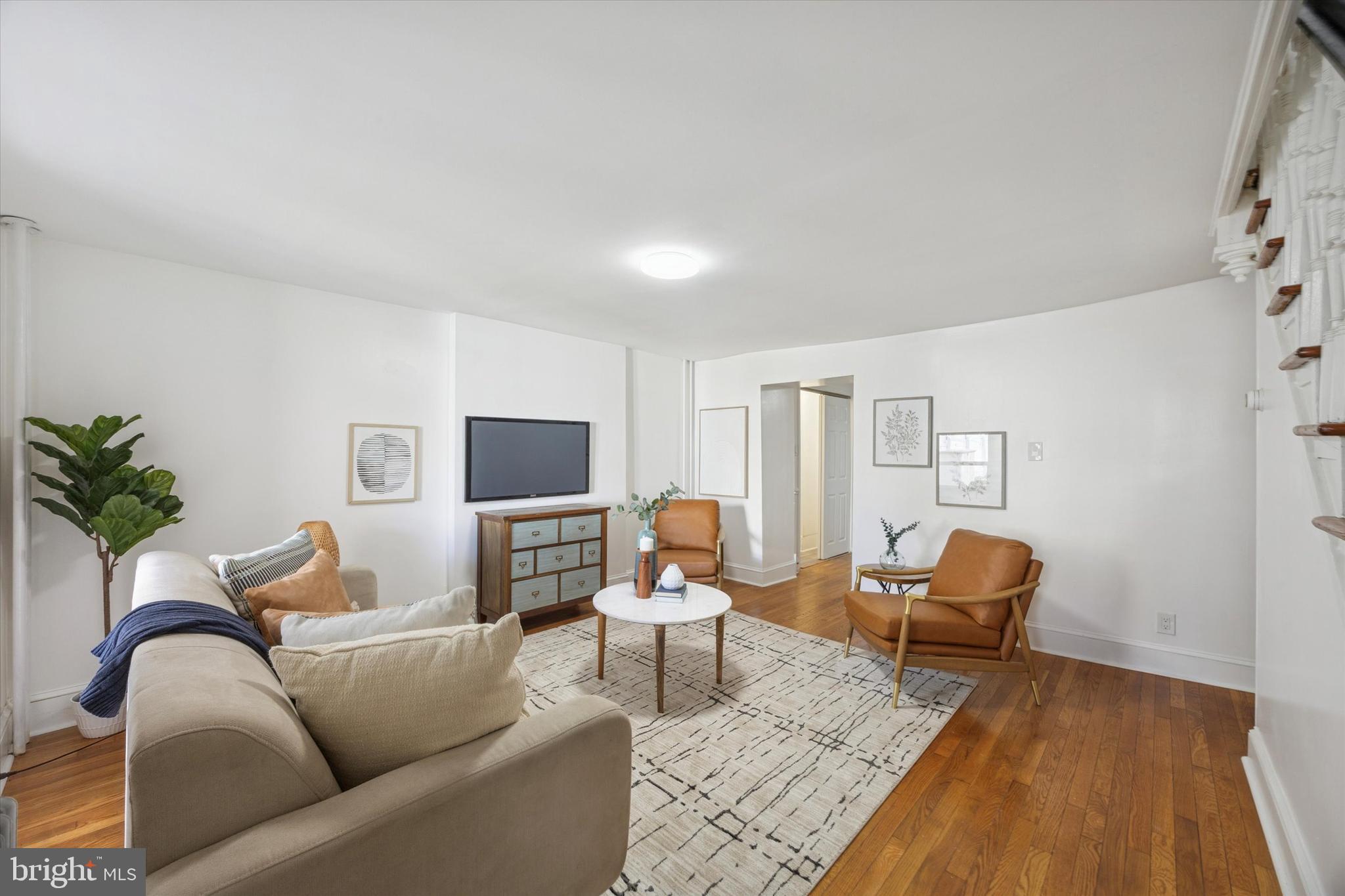 50 Blanchard Road Drexel Hill, PA 19026 - Photo 3 of 35 a living room with furniture and a flat screen tv