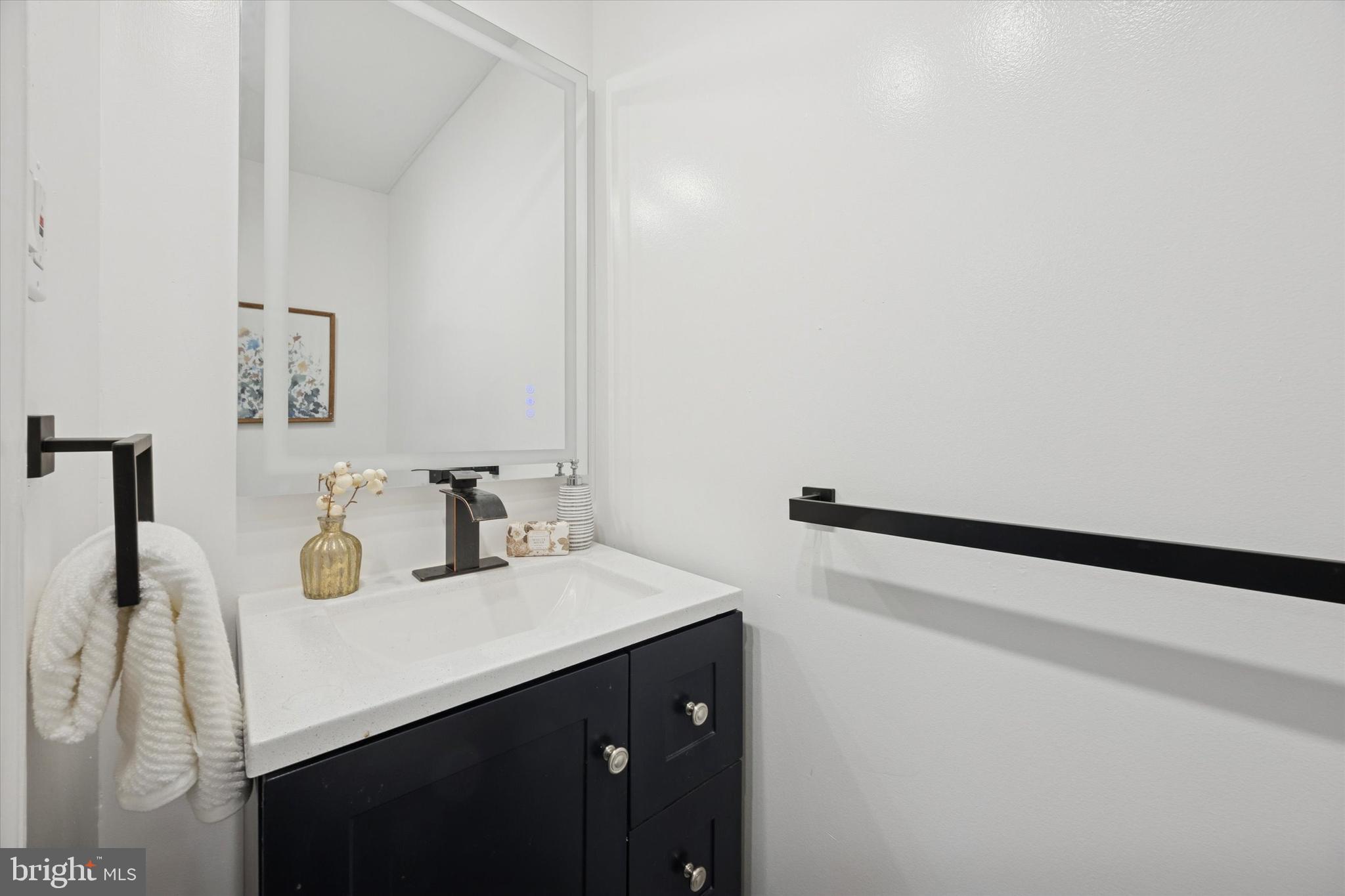 50 Blanchard Road Drexel Hill, PA 19026 - Photo 8 of 35 a bathroom with a sink and a mirror