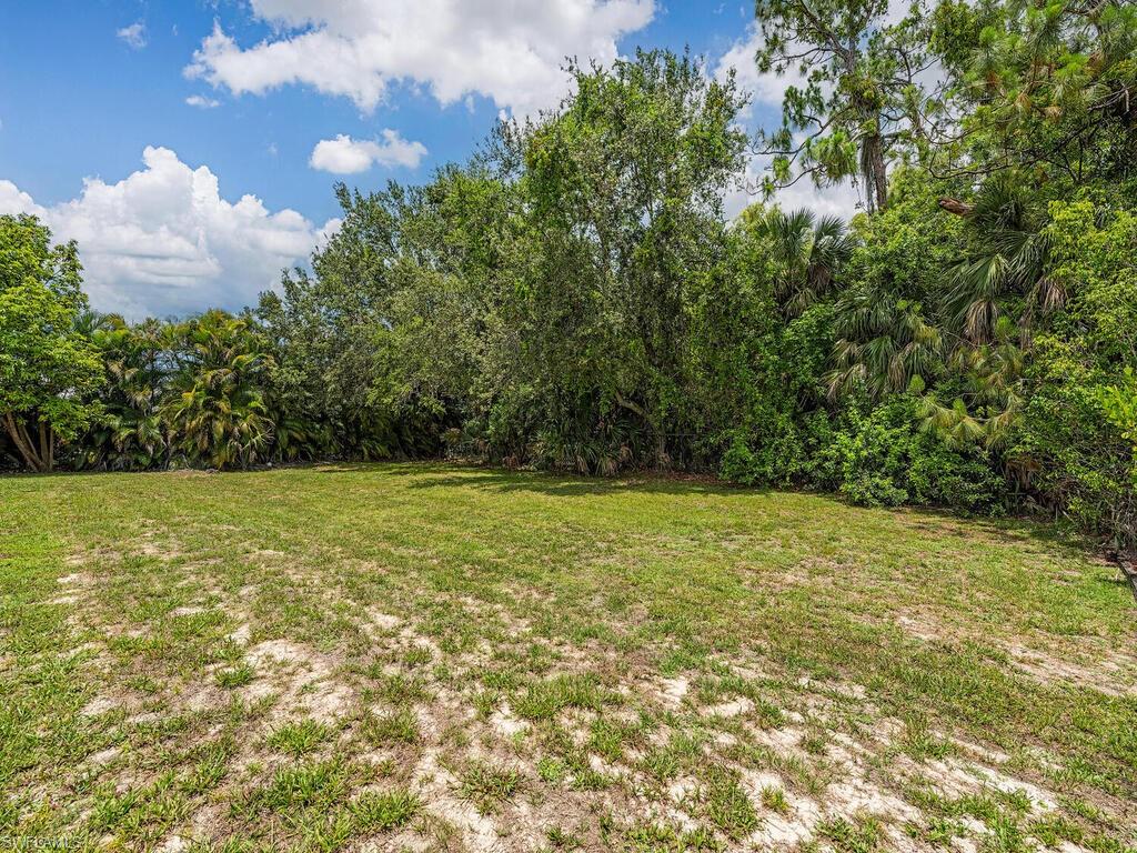 181 6th Street Naples, FL 34113 - Photo 2 of 3 a view of outdoor space and yard
