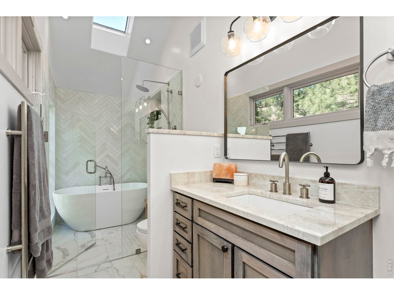 770 North Cedar Brook Road Boulder, CO 80304 - Photo 26 of 50 Soaking tub, walk-in shower, and serene natural light