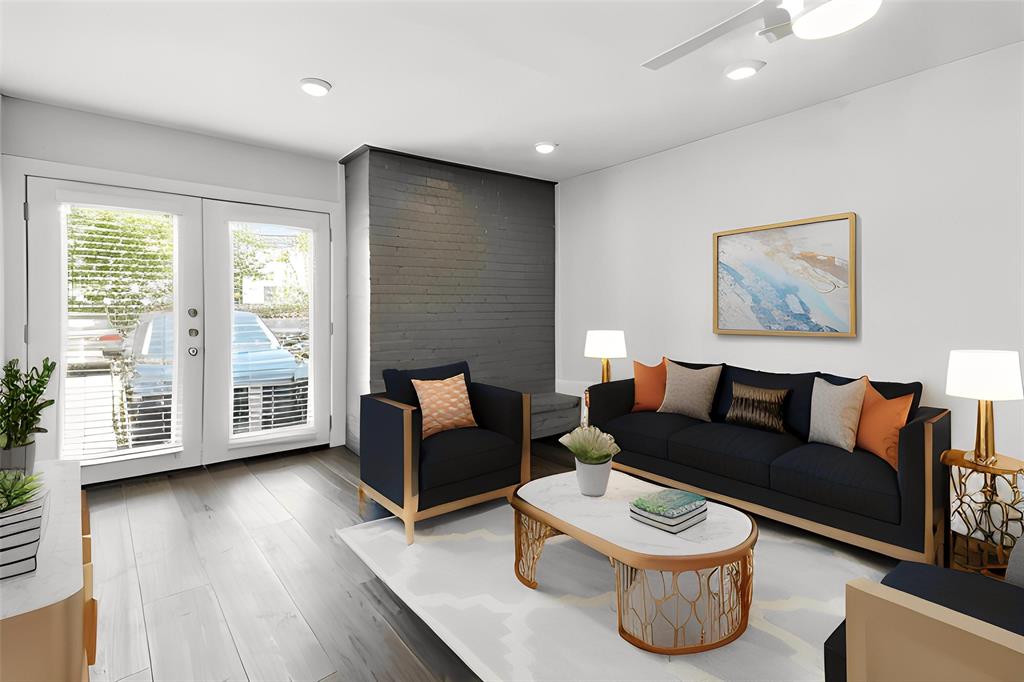 909 Reinli Street, Unit 144 Austin, TX 78751 - Photo 2 of 19 Living area with french doors, wood finished floors, and recessed lighting