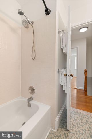 a bathroom with a bath tub