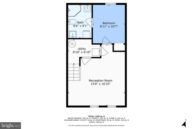 a picture of a bench in front of a wall