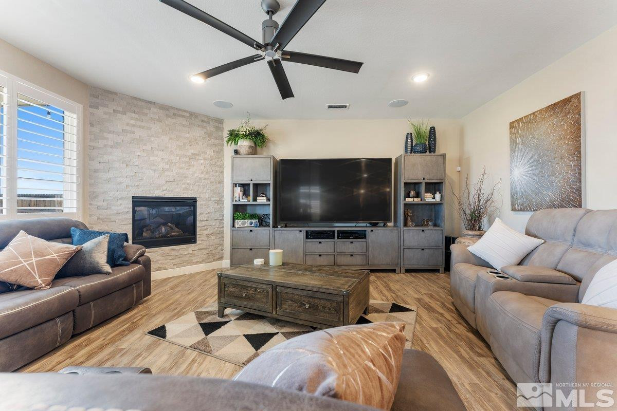 477 Scenic Ridge Drive Reno, NV 89506 - Photo 16 of 40 a living room with furniture and a flat screen tv