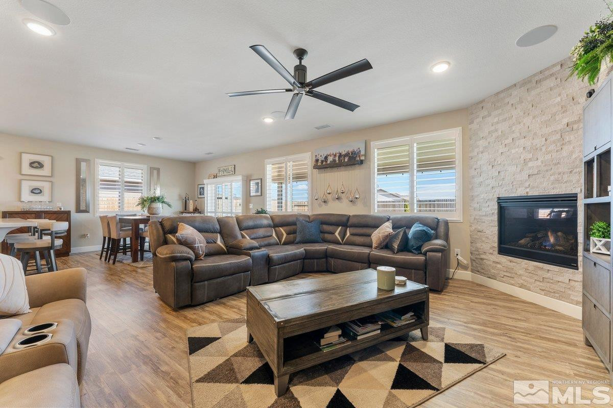 477 Scenic Ridge Drive Reno, NV 89506 - Photo 17 of 40 a living room with furniture a fireplace