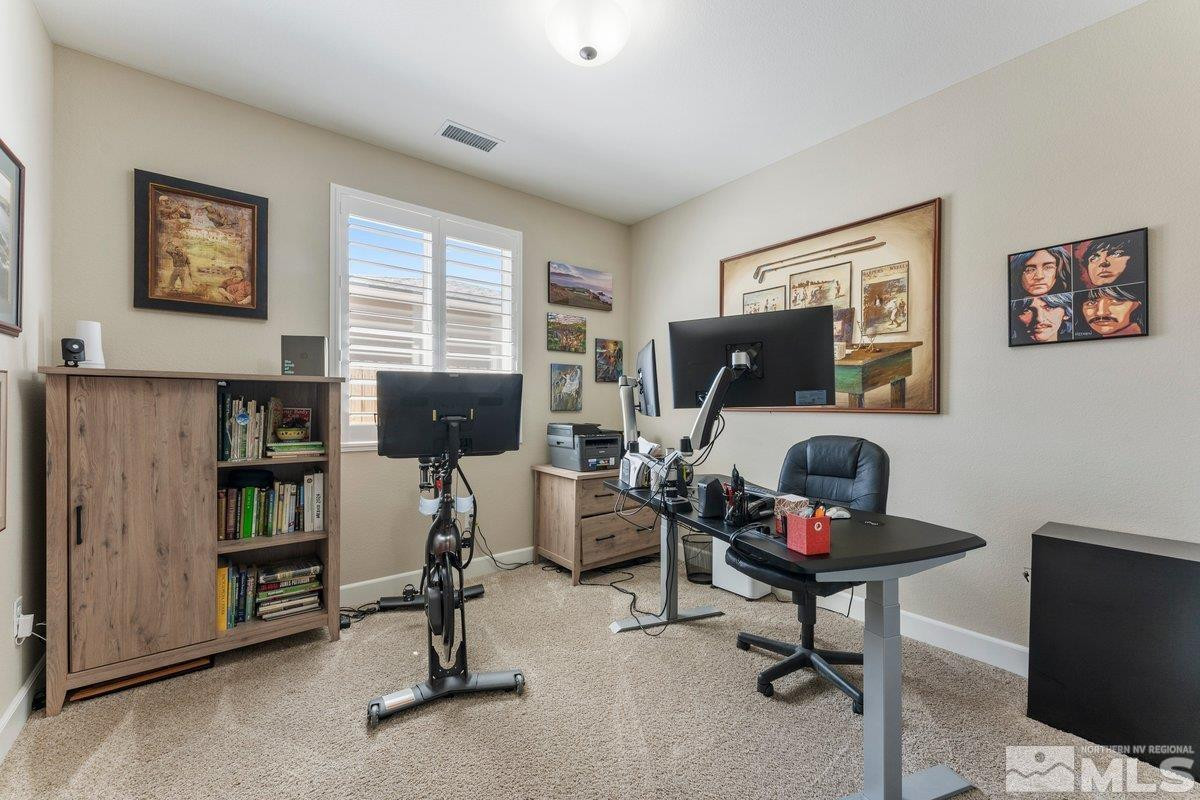 477 Scenic Ridge Drive Reno, NV 89506 - Photo 23 of 40 a view of a livingroom with workspace and a window