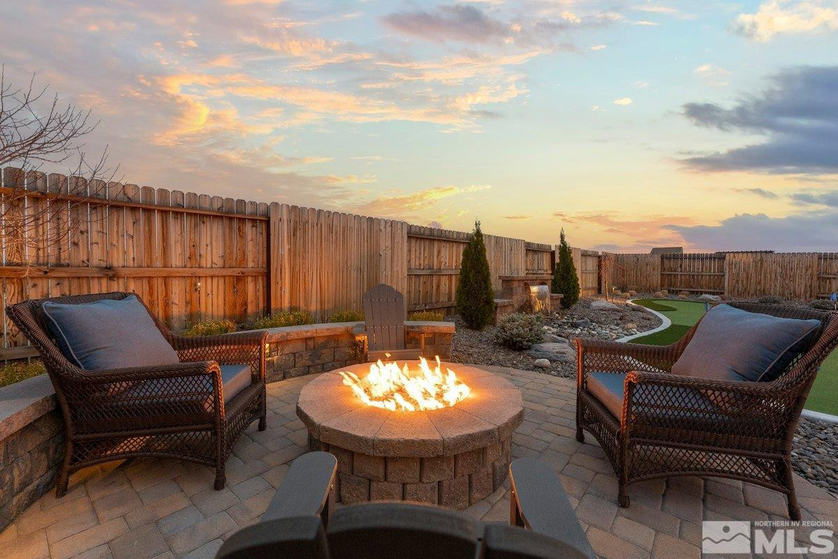 477 Scenic Ridge Drive Reno, NV 89506 - Photo 37 of 40 a view of a chairs and table in the patio
