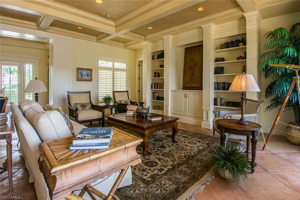 524 Turtle Hatch Road Naples, FL 34103 - Photo 11 of 24 a living room with furniture and a potted plant