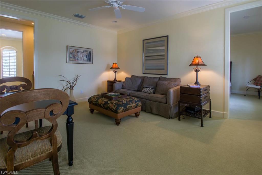 524 Turtle Hatch Road Naples, FL 34103 - Photo 23 of 24 a bedroom with furniture and a window