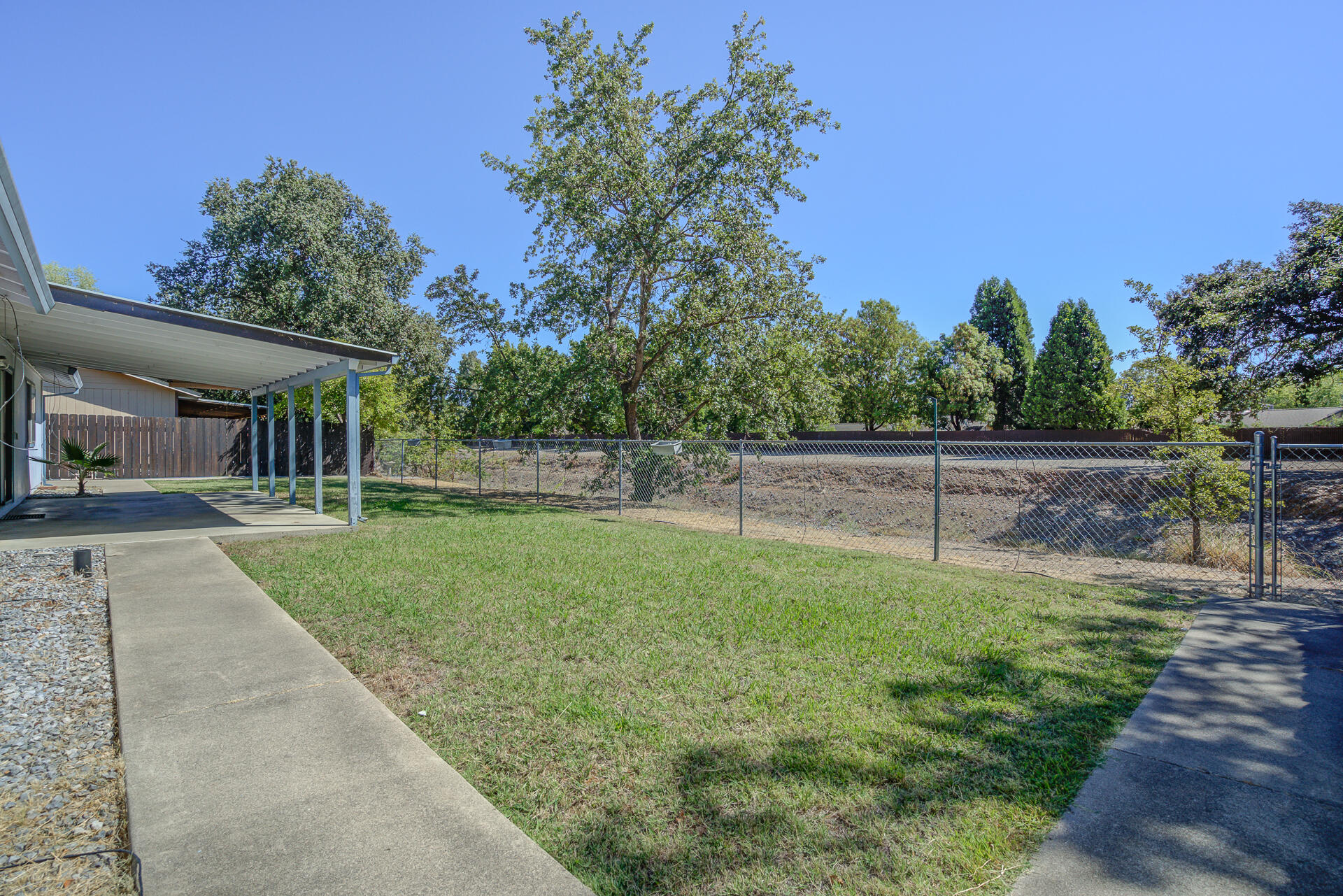 649 Lowe Street Redding, CA 96001 - Photo 21 of 35 a view of a backyard