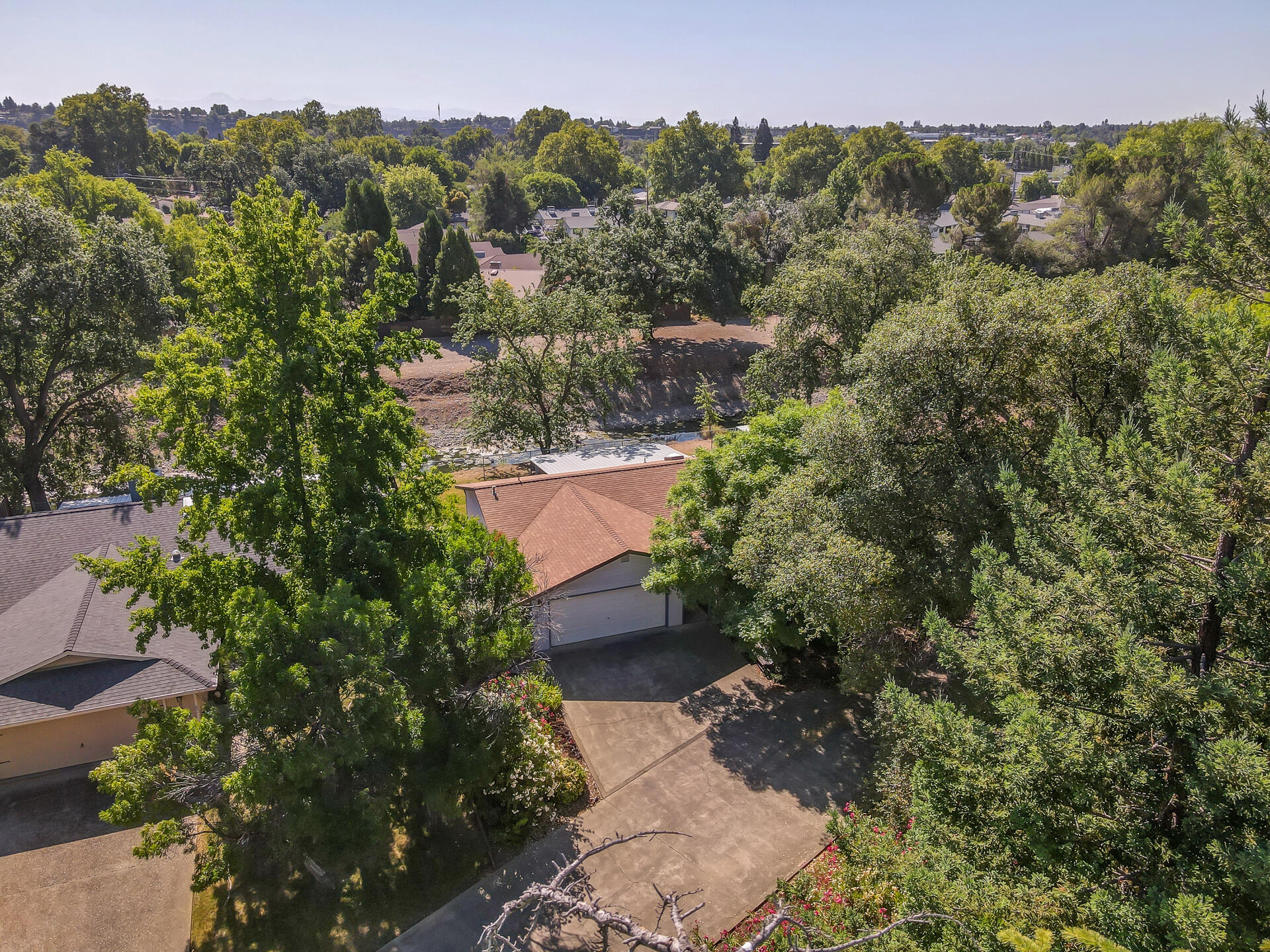 649 Lowe Street Redding, CA 96001 - Photo 29 of 35 an aerial view of a house with a yard