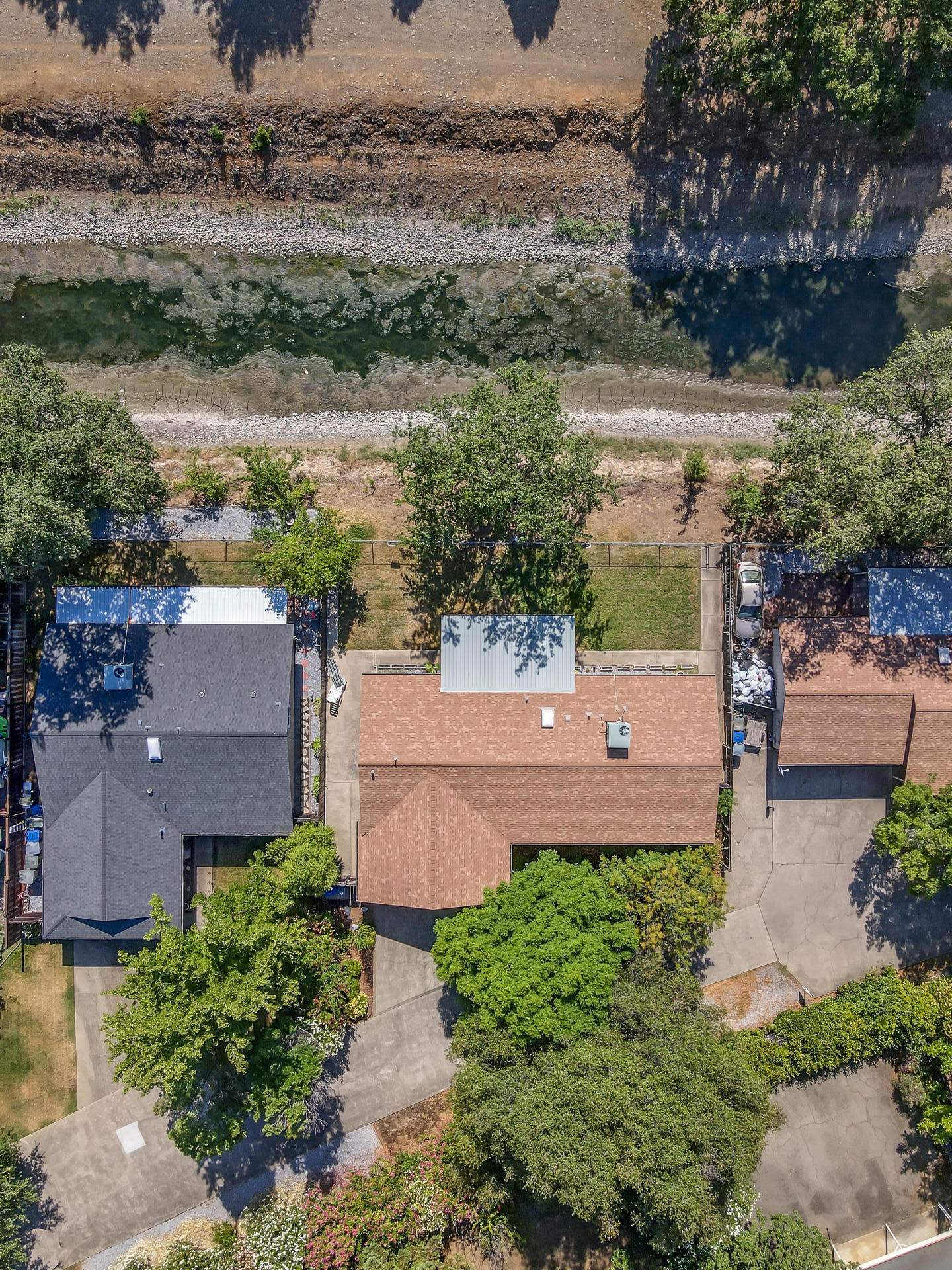 649 Lowe Street Redding, CA 96001 - Photo 30 of 35 an aerial view of a house with a lake view