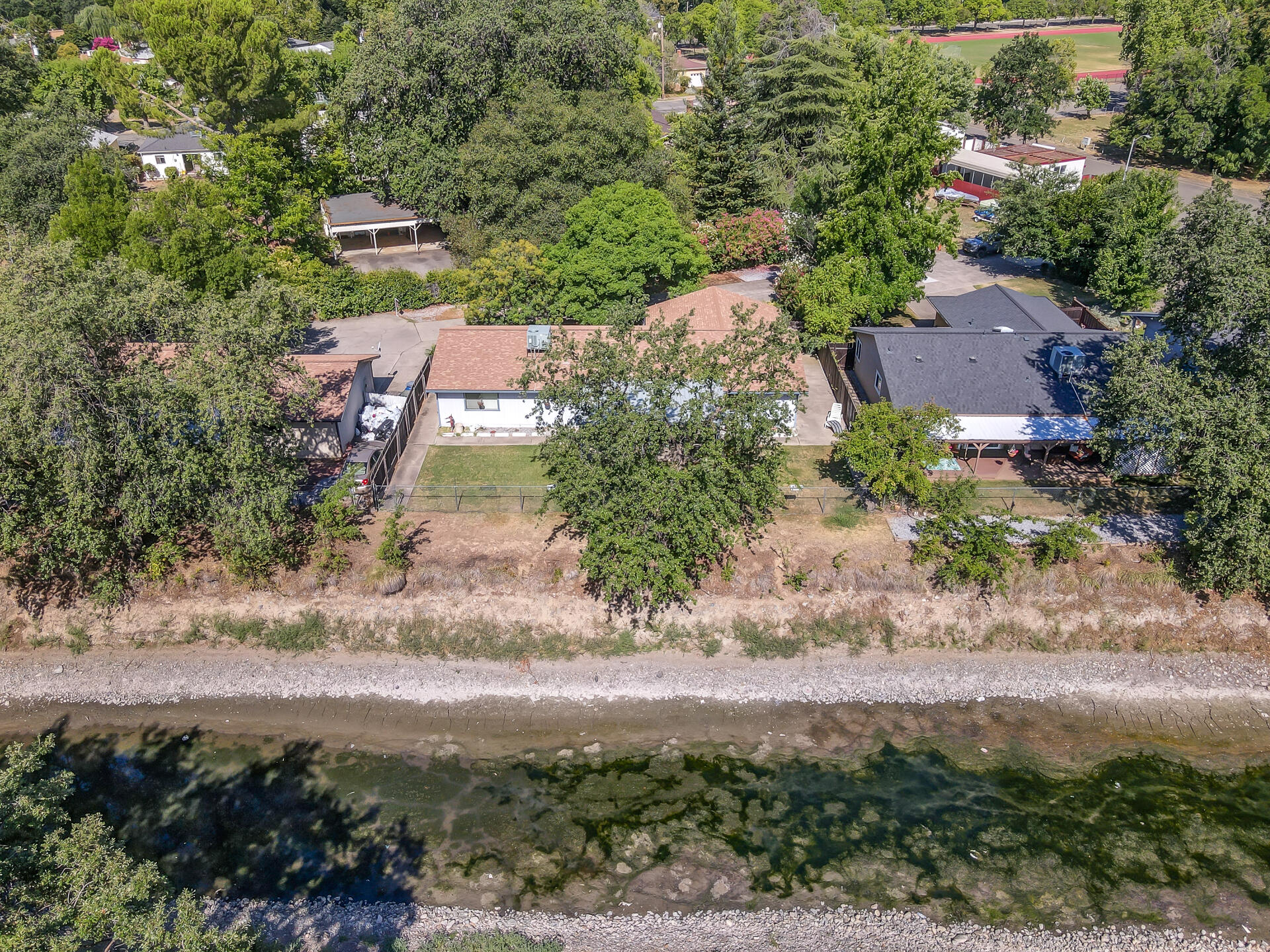 649 Lowe Street Redding, CA 96001 - Photo 31 of 35 an aerial view of residential houses with outdoor space
