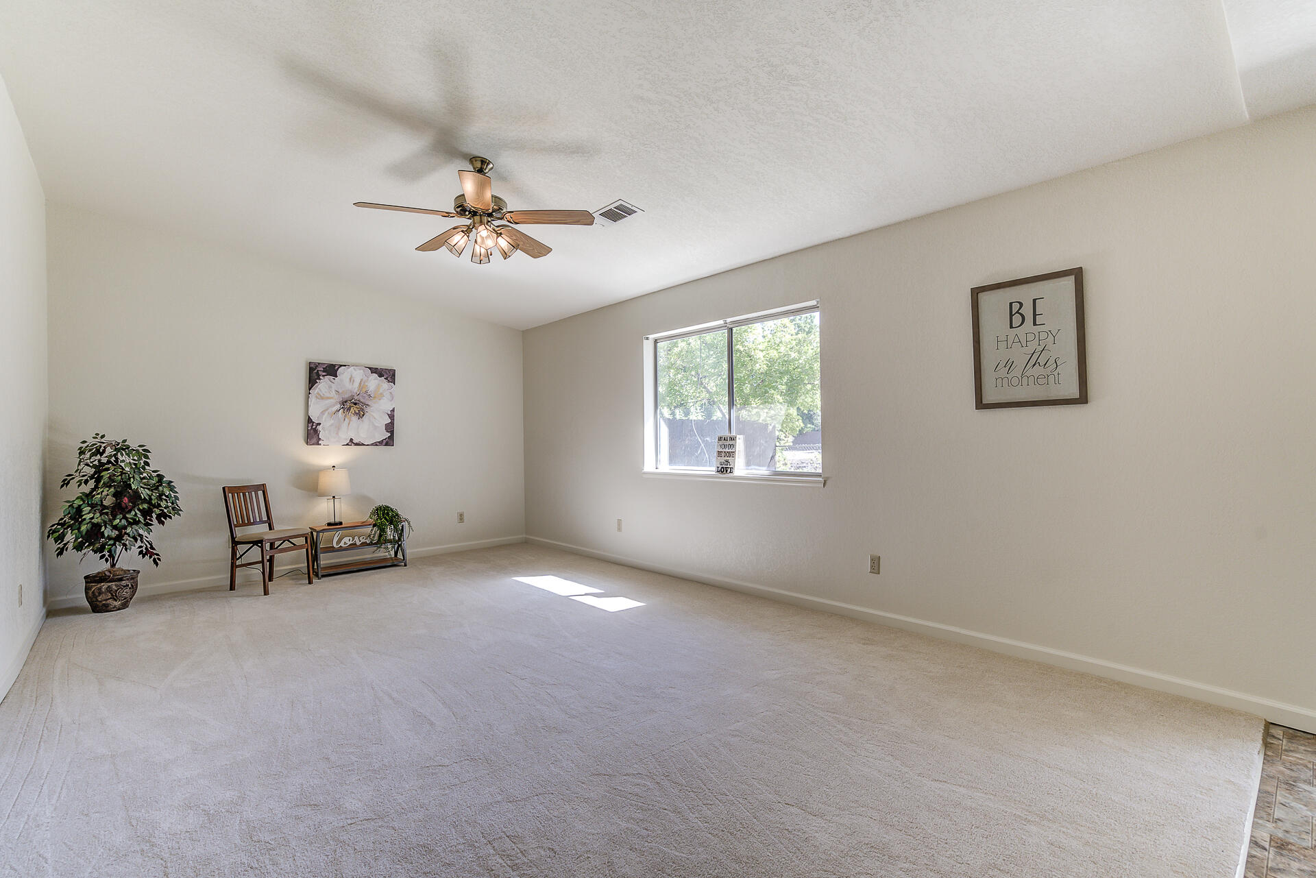 649 Lowe Street Redding, CA 96001 - Photo 8 of 35 a view of an empty room with a window